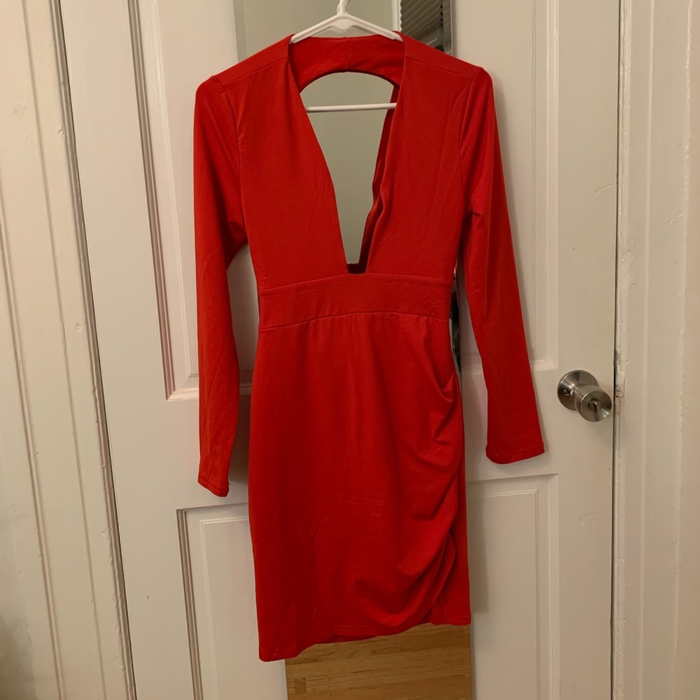 Plunge neck red dress with open back